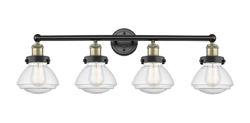 Dust - Resistant Industrial Lighting for Dirty WorkspacesEdison Four Light Bath Vanity Dust - Resistant Industrial Lighting for Dirty WorkspacesEdison Four Light Bath Vanity