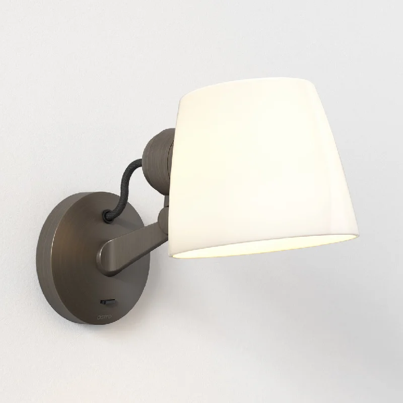 Track lighting for creating a moody atmosphereImari Adjustable Wall Lamp - Bronze/Nickel Track lighting for creating a moody atmosphereImari Adjustable Wall Lamp - Bronze/Nickel