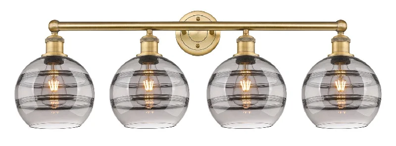 Durable Industrial Lighting for Harsh EnvironmentsDowntown Urban Four Light Bath Vanity Durable Industrial Lighting for Harsh EnvironmentsDowntown Urban Four Light Bath Vanity