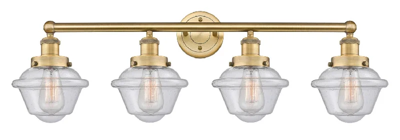 Industrial Lighting for Metal Fabrication ShopsEdison Four Light Bath Vanity
