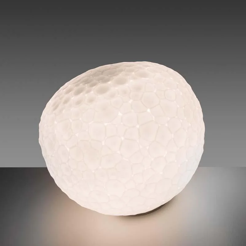 Track lighting for creating a moody atmosphereArtemide 1711018A Meteorite Max 100W E26 White 48 Inch Table Light Track lighting for creating a moody atmosphereArtemide 1711018A Meteorite Max 100W E26 White 48 Inch Table Light