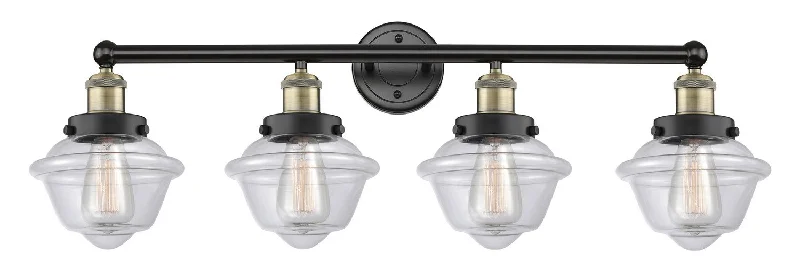 Dust - Resistant Industrial Lighting for Dirty WorkspacesEdison Four Light Bath Vanity Dust - Resistant Industrial Lighting for Dirty WorkspacesEdison Four Light Bath Vanity