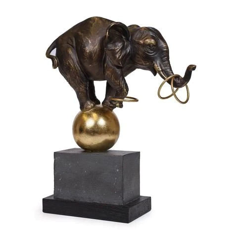 Track lighting with multiple heads for flexibilityElephant at Play Sculpture