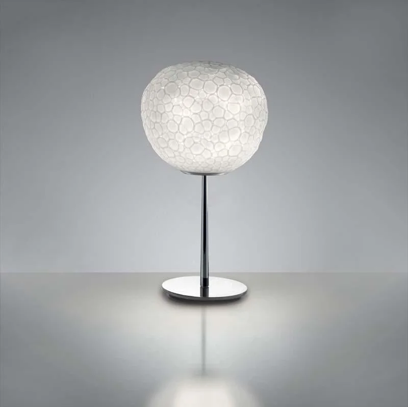 Track lighting with a chunky, bold designArtemide 1705015A Meteorite Max 100W E26 Chrome 35 Inch with stem Table Light Track lighting with a chunky, bold designArtemide 1705015A Meteorite Max 100W E26 Chrome 35 Inch with stem Table Light