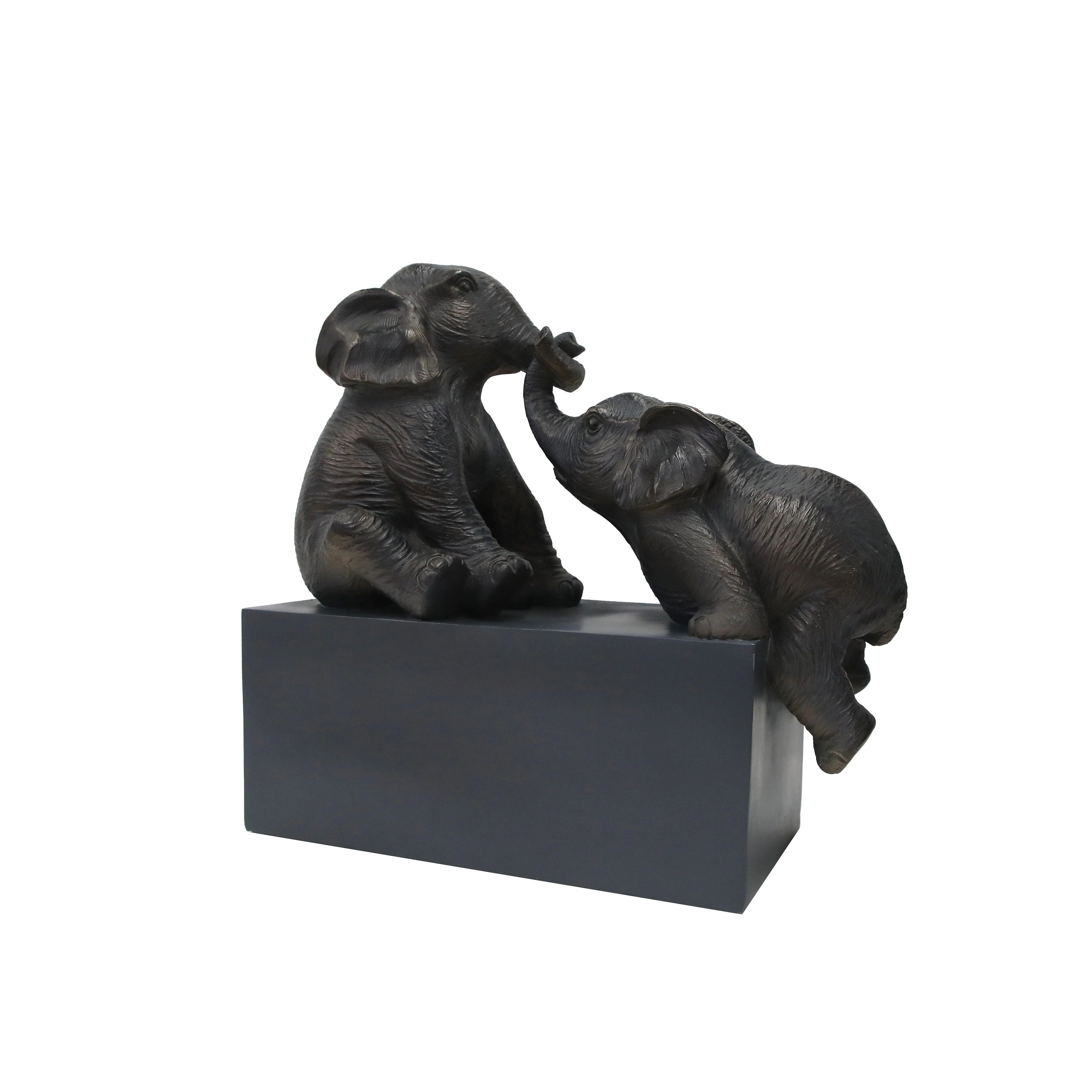 Wireless track lighting for easy installationA Helping Hand - Elephant Sculpture