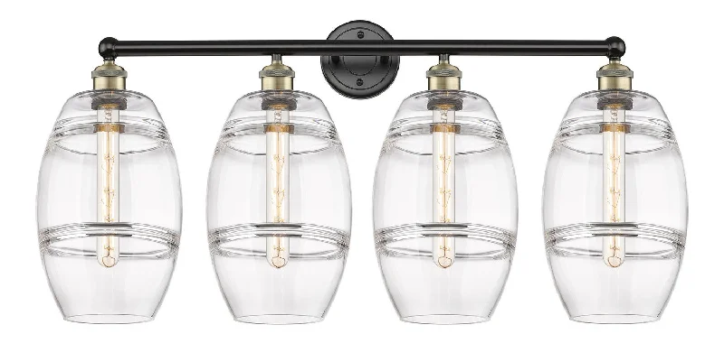Industrial Lighting for Automotive Manufacturing PlantsDowntown Urban Four Light Bath Vanity Industrial Lighting for Automotive Manufacturing PlantsDowntown Urban Four Light Bath Vanity