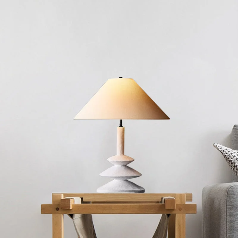 metal table lamps with a matte black finish for a sleek appearancemetal table lamps with a matte black finish for a sleek appearanceModern 3-Tier Resin Table Light: Stylish 1-Light White Nightstand Lamp with Wide Flare Shade
