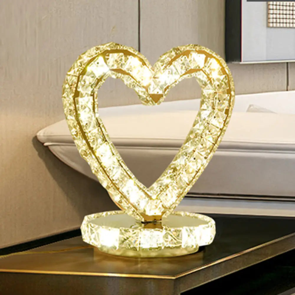 glass table lamps with a frosted surface for soft light diffusionglass table lamps with a frosted surface for soft light diffusionMetal Chrome Finish Night Table Light with LED Modernism, Heart/Round Design & Crystal Accent - Perfect for Bedside