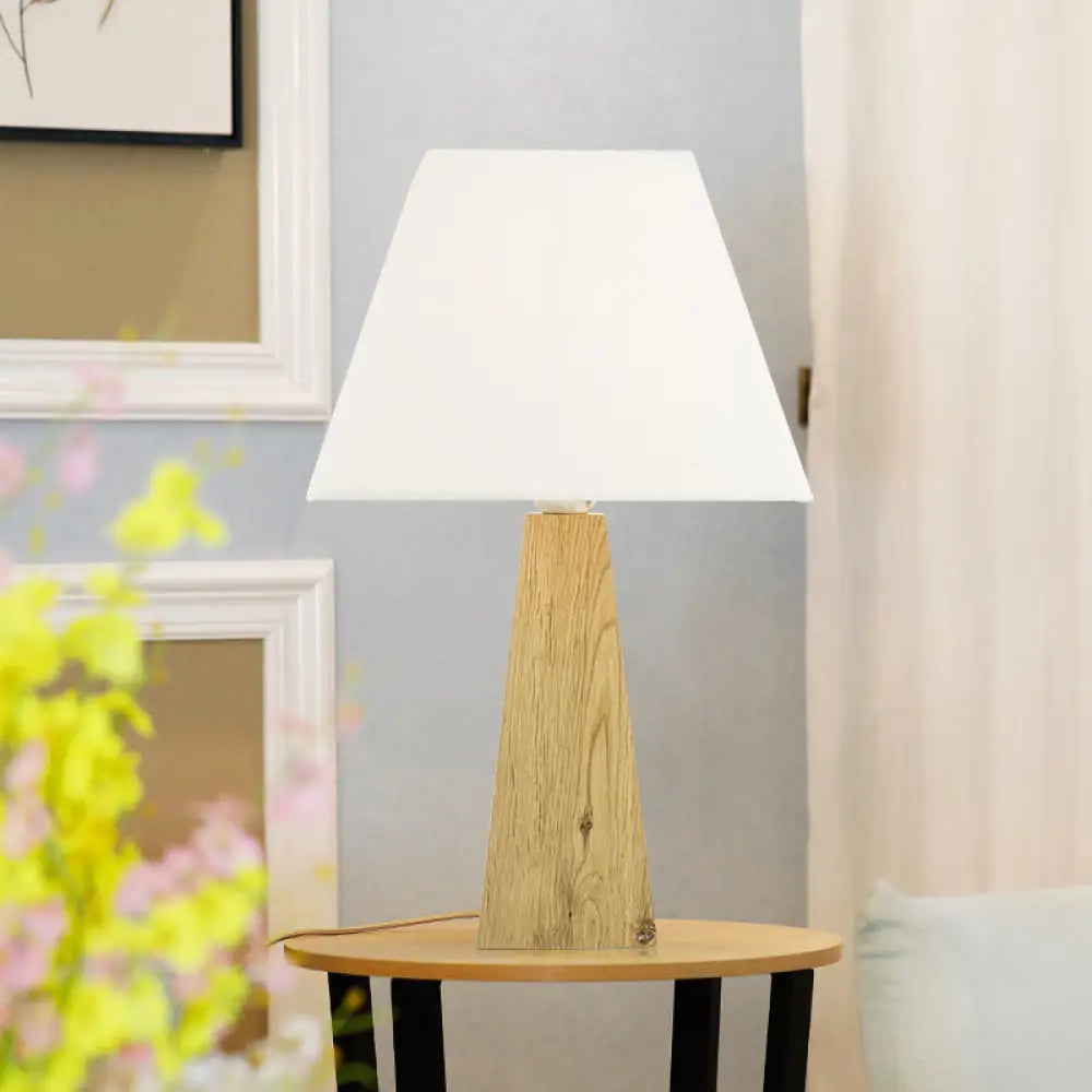 fabric table lamps with a linen shade for a relaxed and breathable lookfabric table lamps with a linen shade for a relaxed and breathable lookMinimalist Taupe/White Pagoda Table Lamp with Pyramidal Wood Pedestal